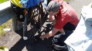 Fixing the first flat. We didn't know it at the time, but it would be the first of many.